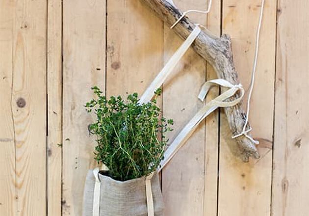 A HANGING HERB POT